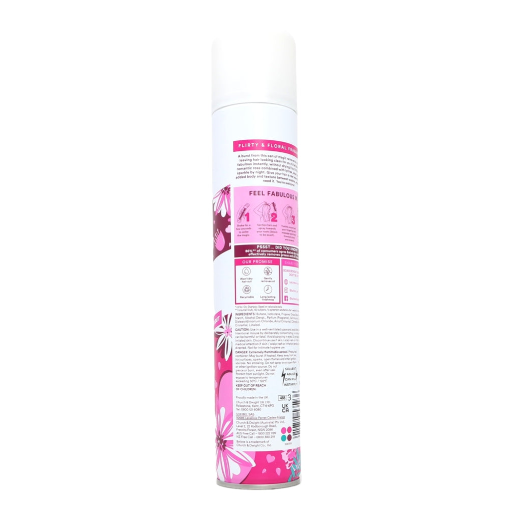 Dry shampoo Spray Can with pink floral design and text on a white background