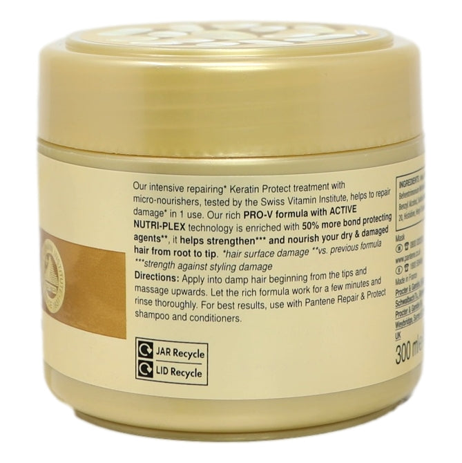 Back view of a beige hair care product jar with text and recycling symbols on a white background