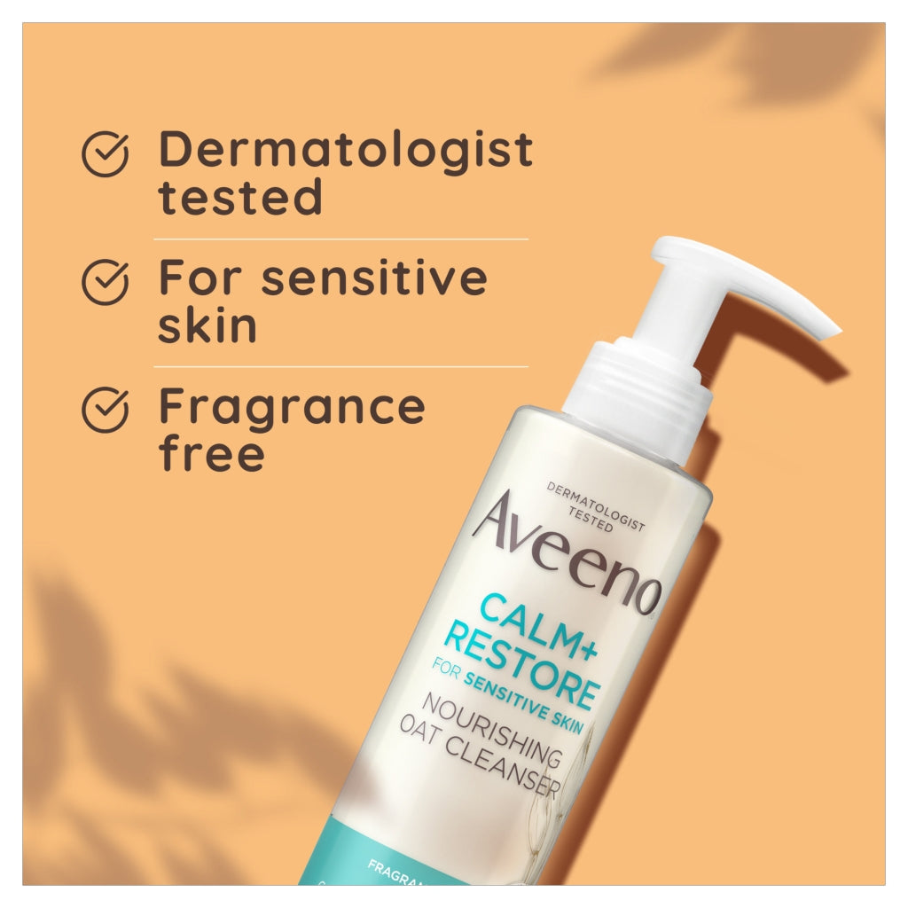 Aveeno Calm + Restore cleanser bottle on a peach background with product benefits text.