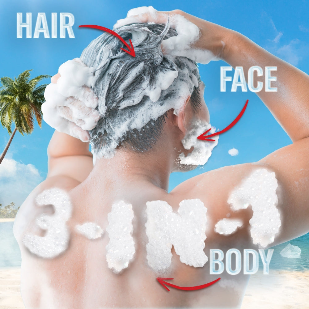 Person with shampoo on head, face, and body with beach background
