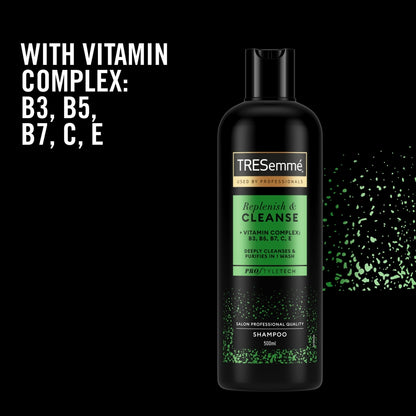 TRESemmé shampoo bottle with vitamin complex text on a black background