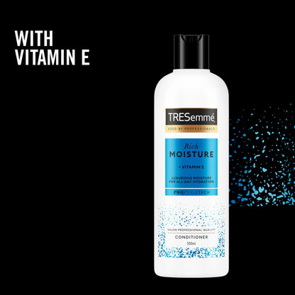 TRESemme Rich Moisture conditioner bottle with Vitamin E on a black background