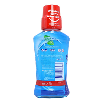 Bottle of Aquafresh mouthwash with a red cap on a white background