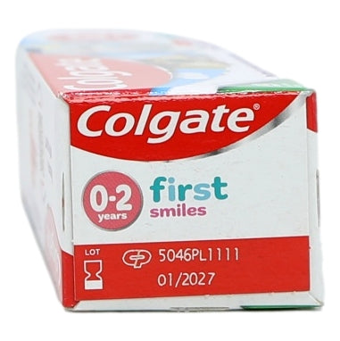 Colgate first smiles toothpaste for infants on a white background