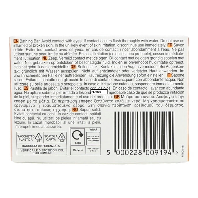 Back of a soap packaging with text and bar code on a white background